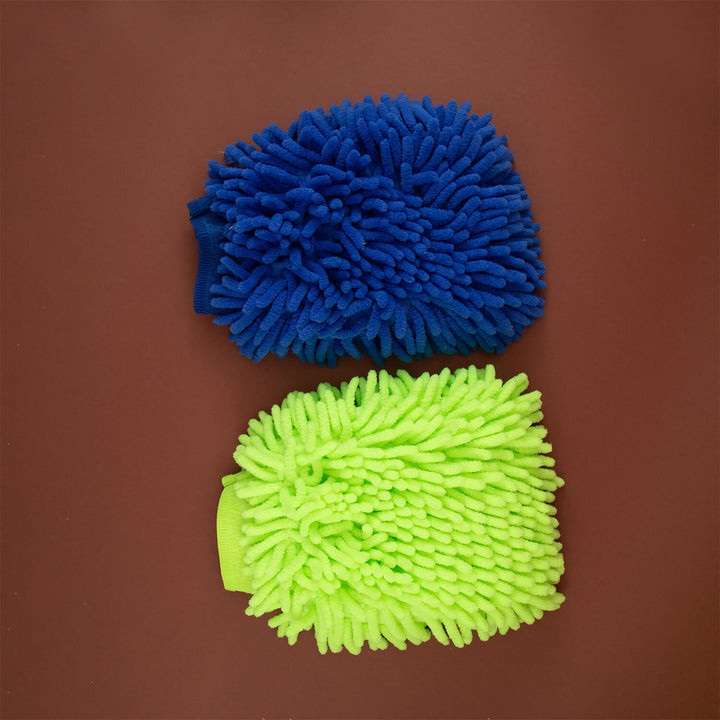Blue and green microfiber cleaning mitts , cleaning cloths, microfibre, cleaning supplies on a brown background