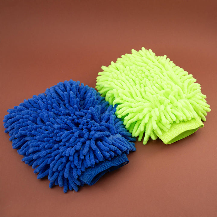 Blue and green microfiber cleaning mitts, cleaning cloths, cleaning supplies, microfibre cloths on a brown background