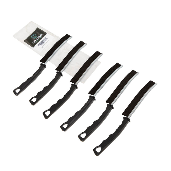 Set of black crevice cleaning brush, cleaning tools, microfiber, cleaning supplies black handles on a white background